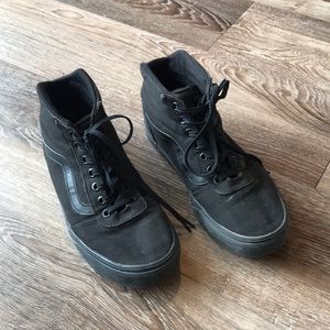 Solid black canvas vans high top sneakers
